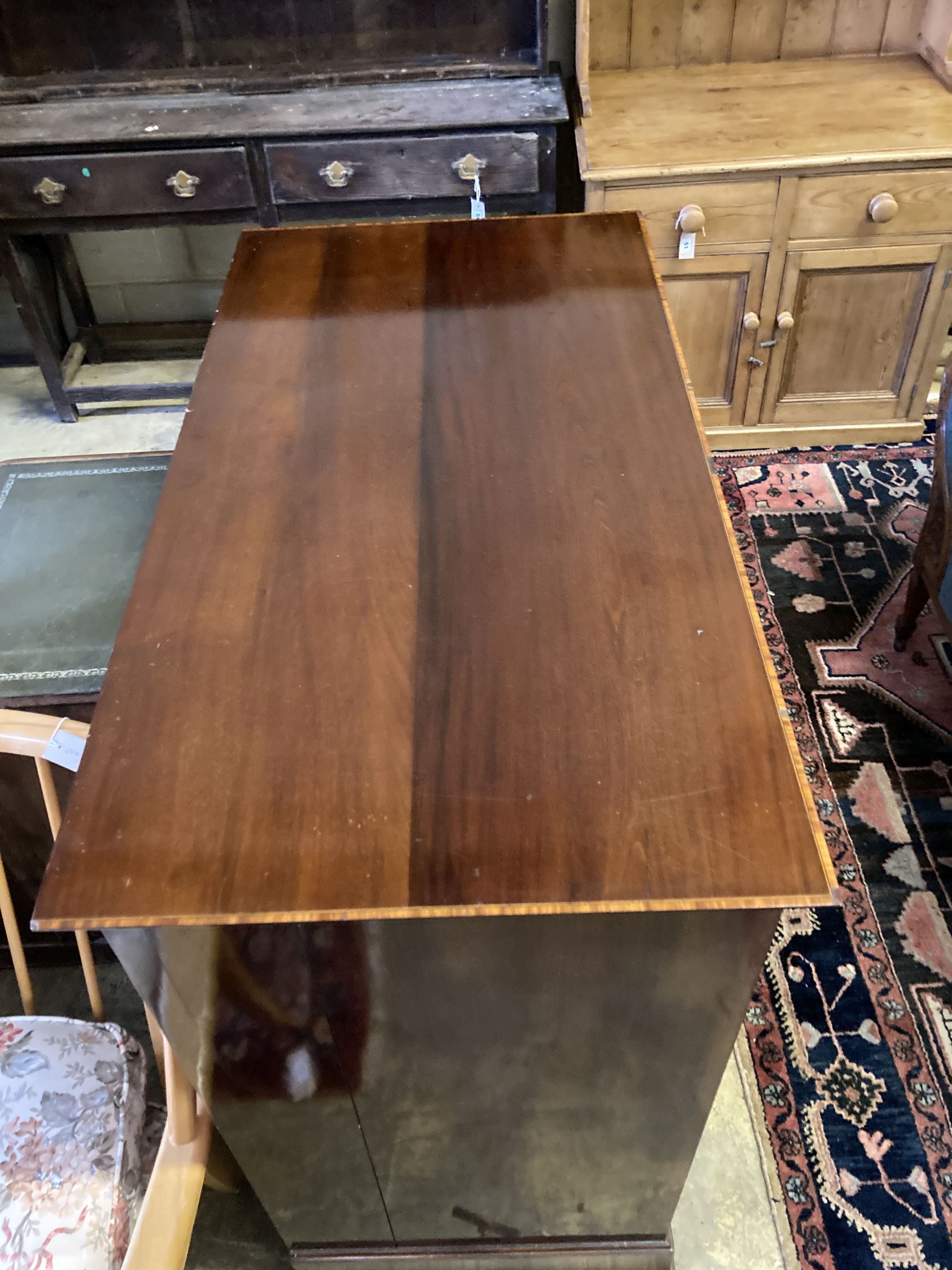 An Edwardian Maples banded mahogany chest, width 107cm, depth 56cm, height 108cm